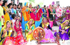 Students perform during the Teej celebrations at KMV College in Jalandhar on Wednesday