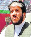 Hurriyat Conference leader Shabir Ahmad Shah addresses a press conference in Srinagar on Wednesday. Tribune photo: Amin War