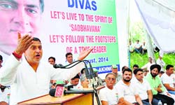 Sham Lal Sharma addresses the gathering in the Akhnoor area of Jammu on Wednesday. Tribune photo: Inderjeet Singh