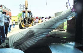 Encroachments being removed by the tehbazari wing from Transport Nagar