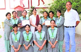 The students of Green Land Senior Secondary Public School are all smiles at their achievement in Ludhiana on Wednesday