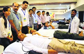 Volunteers donate blood at the first mega blood donation camp organised by the Playwin foundation in Ludhiana