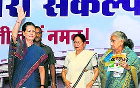 Congress chief Sonia Gandhi with party leaders Mohsina Kidwai (C) and Chandresh Kumari Katoch in New Delhi.