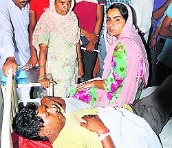 AAP candidate Baljinder Kaur visits her injured driver Gurbax Singh at the Talwandi Sabo Civil Hospital on Wednesday