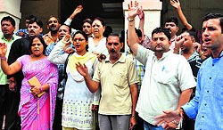 BJP councillors protest outside the Public Works Department office in Dehradun on Wednesday