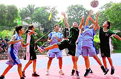 Girls in action during a basketball match at Aryan School in Dehradun on Wednesday