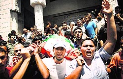 Relatives of Widad Deif, the wife of Hamass military commander Mohammed Deif, carry her body during her funeral procession in the Gaza Strip on Wednesday