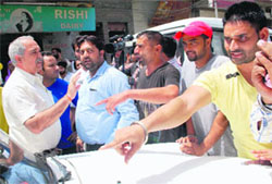 Supporters of a private hospital owner threaten a Health Department probe team as it decided to leave after it was denied entry to the place in Amritsar on Thursday