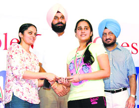Revenue Minister Bikram Singh Majithia felicitates the winners of the Punjab State Inter-School Shooting Championship in Amritsar on Thursday.