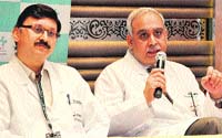 Dr Virendar Sarwal, director and head, CTVS, Max Super Speciality Hospital, Mohali, and Dr Deepak Puri at a press conference at a local hotel in Sector 43-B in Chandigarh on Thursday. Tribune photo: Parvesh Chauhan