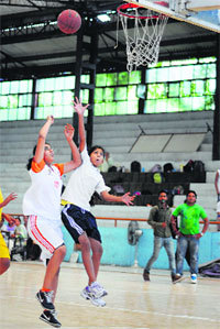 A basketball match in progress during the district school games at Guru Nanak Stadium in Ludhiana.