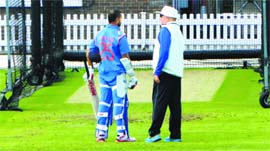 Duncan Fletcher giving some tips to Shikhar Dhawan at Lords on Wednesday. Ravi Shastri says his appointment as Director wont undermine Fletchers position.