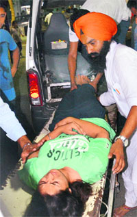 NSUI chief patron Simranjeet Kaur Gill being taken to the GMSH-16 after her condition deteriorated during a hunger strike late on Friday evening