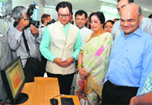 Union Minister of State for Home Affairs Kiren Rijuju (left), MP Kirron Kher and UT Adviser KK Sharma during the launch of a 200 kW solar power plant at the Post Graduate Government College for Girls in Sector 42, Chandigarh, on Friday