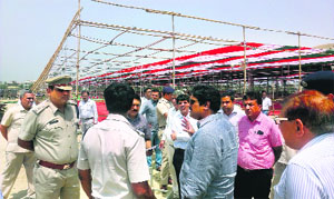 Deputy Commissioner Ajit Balajit Joshi takes stock of the preparations for the Congress rally in Panipat.