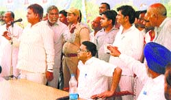 BSP leaders argue with one another in Jalandhar on Friday. Tribune Photo: Malkiat Singh