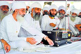 Thakur Dalip Singh (first left) in Ludhiana on Friday.