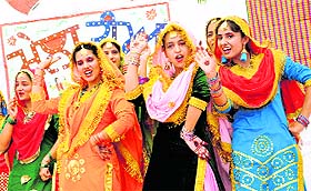 Girls perform in a gidda competition during the teej festival in Kala Tibba village, Abohar, on Friday. Amandeep and Komal have been adjudged as gidda queens in college and school categories, respectively.