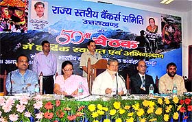 Chief Minister Harish Rawat presides over 50th state-level bankers meeting in Dehradun on Thursday.