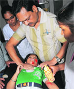 An injured student receives medical attention at the Civil Hospital in Bathinda on Saturday. Tribune photo