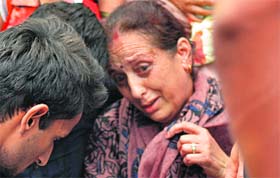 Relatives console deceased Gaurav Gargs mother at the GMSH in Sector 16 on Saturday.