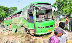 The damaged Volvo bus of the HRTC.