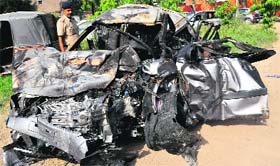 The mangled remains of the Ill-fated car.