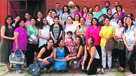 Members of the Carmel Ex-Students' Association pose for a group photograph during their reunion in Chandigarh on Saturday.