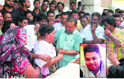 Wailing kin of Rohit Sabharwal (inset) who was stabbed to death during his birthday celebrations at Haveli restuarant on Friday night near Jalandhar. A Tribune Photograph