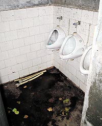 Urinal pots without pipes at a government elementary school in Amritsar