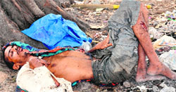 An unidentified ailing person deserted near the PGI in Chandigarh. A file photograph