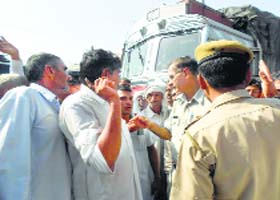 Protesters argue with cops in Kalayat on Sunday