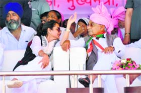 Chief Minister Bhupinder Singh Hooda and Cabinet Minister Kiran Chaudhry at a rally in Panipat on Sunday