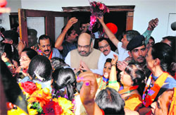 BJP national president Amit Shah interacts with women party workers in Jammu on Sunday. Tribune Photo: Inderjeet Singh