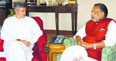 Union Minister for Agriculture Radha Mohan Singh with Chief Minister Omar Abdullah in Srinagar on Sunday. A Tribune photograph
