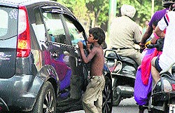 A beggar seeks alms in Jalandhar