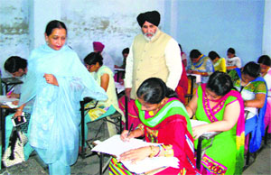 Candidates take TET at Government School, Dholewal, in Ludhiana on Sunday