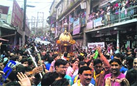 A palanquin carrying an idol of Lord Krishna passes through Mussoorie areas on Sunday