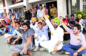 PUSU activists stage a protest in front of the UIET Department at Panjab University on Monday.