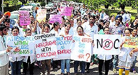 Students of Dr Harvansh Singh Judge Institute of Dental Sciences and Hospital take out a rally at Panjab University; and (below) activists of the National Students Union of India serve refreshments to students on Monday. Tribune Photos: S Chandan