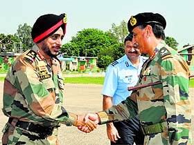 GOC-in-C of the Western Command Lt Gen KJ Singh being received at the Technical Airport in Jammu on Monday. 