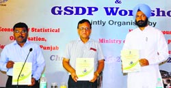 Parminder Singh Dhindsa, Finance Minister (right), releases provisional results of the economic census of Punjab in Chandigarh on Monday. Tribune photo