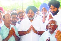 Deputy CM Sukhbir Badal and Bikram Majithia at the cremation of party leader BD Junejas son in Patiala on Monday. Tribune photo