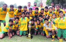 Members of Wynberg Allen School, Mussoorie, with their trophy at St Josephs Academy in Dehradun on Monday