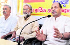 Mahaveer, a senior VHP leader, addresses a press conference in Dehradun on Monday