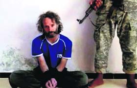 Peter Theo Curtis, a US citizen held hostage in Syria, delivers a statement