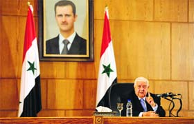 Syrias Foreign Minister Walid al-Moualem speaks during a press conference in Damascus on Monday