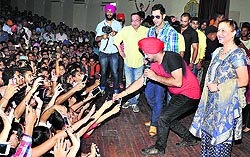 Punjabi singer-actor Gippy Grewal and comedian-actor Gurpreet Ghuggi at Guru Nanak Dev University for the promotion of movie Double Di Trouble in Amritsar on Tuesday