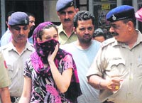 A file photo of the accused, Vajinder and his paramour Renu, at the District Courts in Chandigarh.