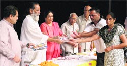 MP Kirron Kher felicitates eye donors and their families at Tagore Theatre, Sector 18, Chandigarh, on Tuesday. A Tribune photograph